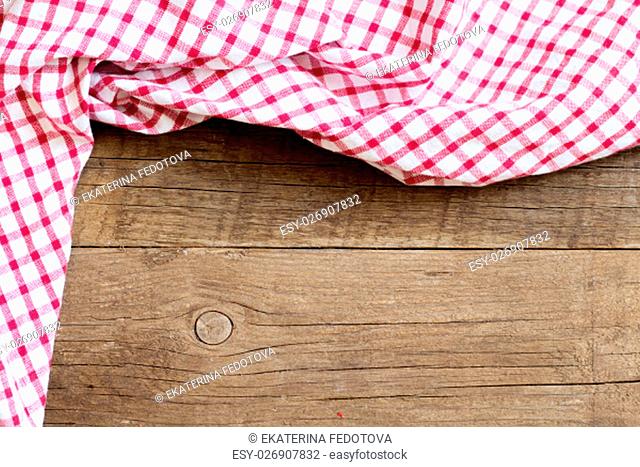 Checkered tablecloth on the old wooden table