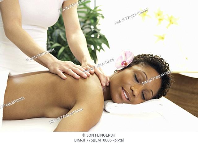 African woman receiving massage 
