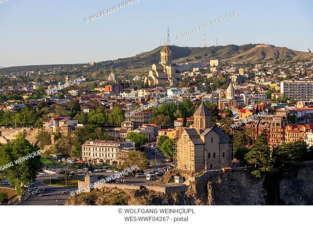 Georgia, Tbilisi, Kura river and Sameba Cathedral in old town