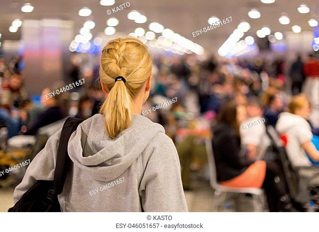 Woman waiting on airport terminal