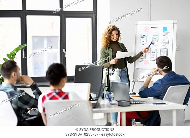 creative woman showing user interface at office