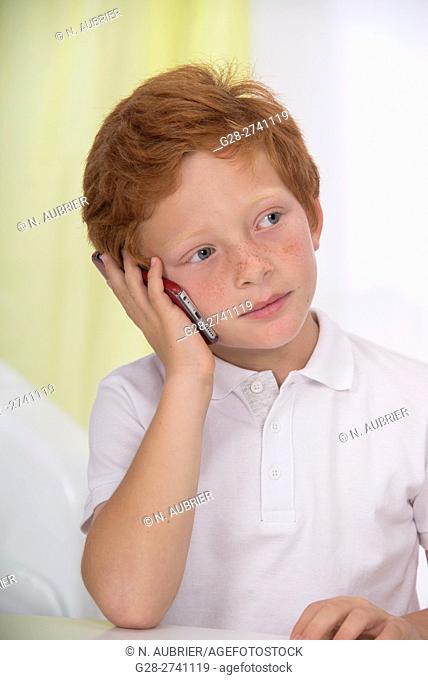 6 year old boy phoning with an i-phone