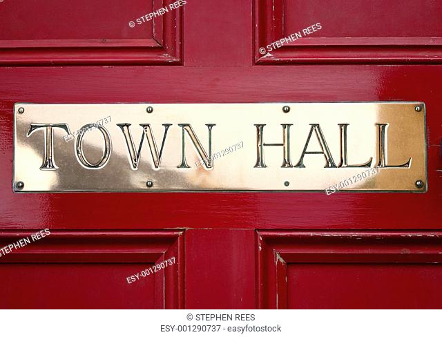 Brass Town Hall sign on a door