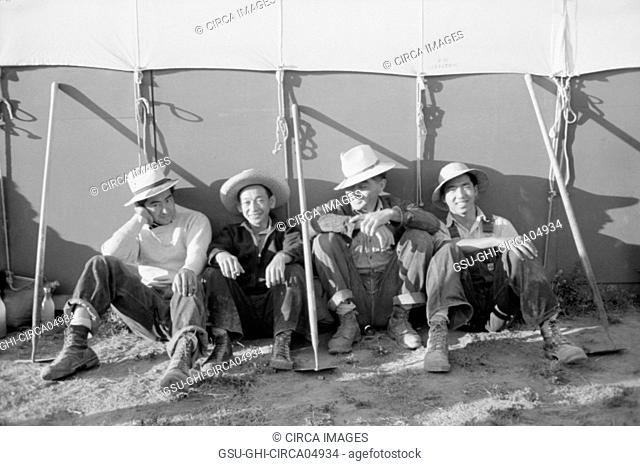 Japanese-American Farm Workers outside their Tent, Farm Security Administration (FSA) Mobile Camp, Nyssa, Oregon, USA, Russell Lee, Farm Security Administration