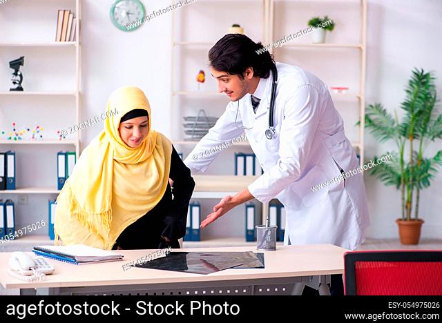 Female arab patient visiting male doctor
