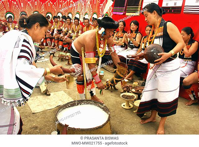 People from the ethnic Angami community having food on the annual Hornbill festival at the village of Kisama in Nagaland