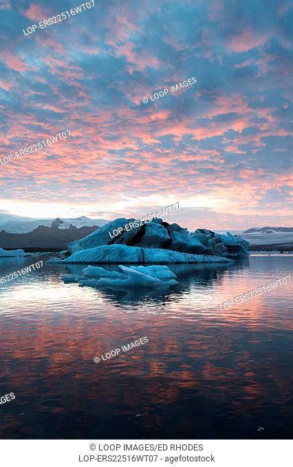 Dramatic red sunset at Jokulsarlon Iceberg Lagoon