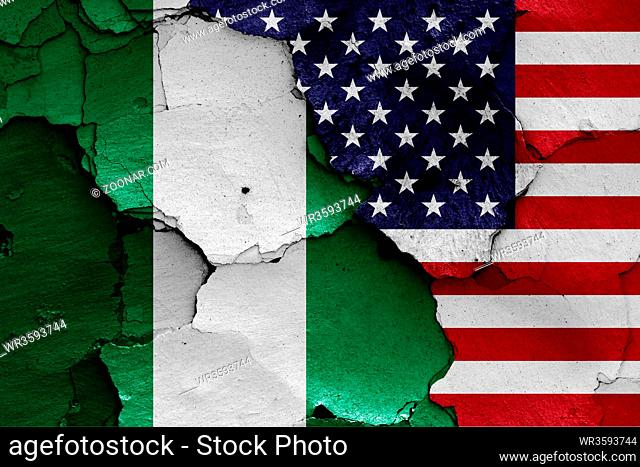 flags of Nigeria and USA painted on cracked wall