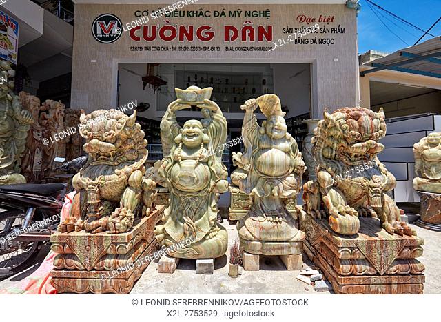 Marble statues displayed in front of a shop. The Marble Mountains, Da Nang, Vietnam