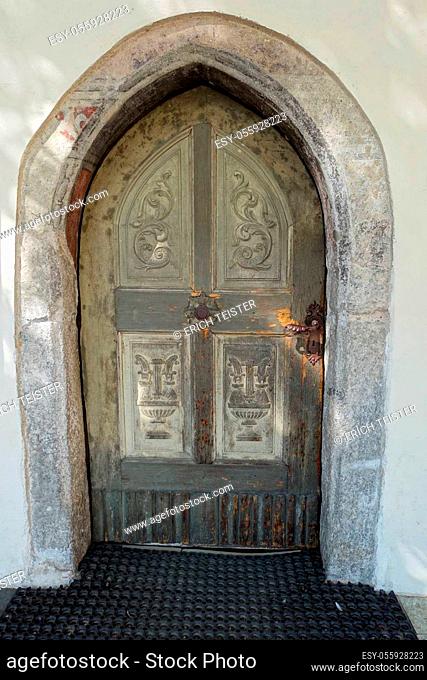 Entrance door to the hospital church of the Holy Spirit, Sterzing, South Tyrol, Italy
