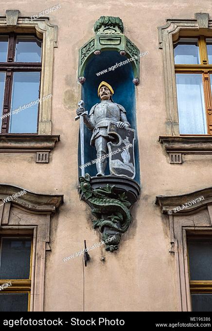 Tenement house with figurine of knight on Most Paulinski Street in Old Town of Torun, Kuyavian Pomeranian Voivodeship of Poland