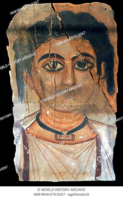 Roman-Egyptian Fayum encaustic coffin portrait on Wood. Roman Period (2nd-3rd centuries AD). Fayum portraits are a sign of the continuity of pharonic funerary...