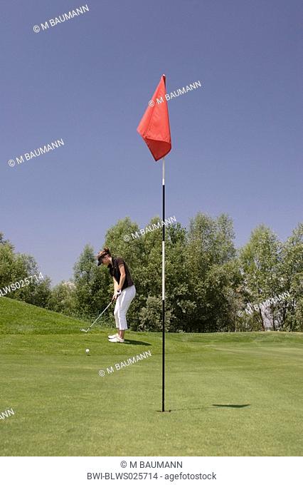 golf player at golf course