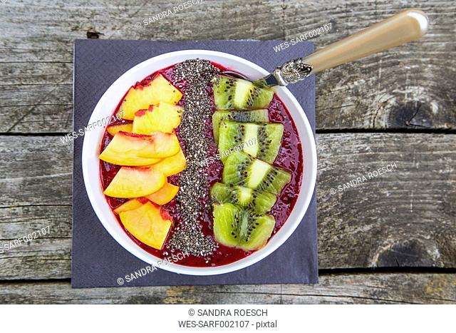 Smoothie with fruits and chia seeds in bowl