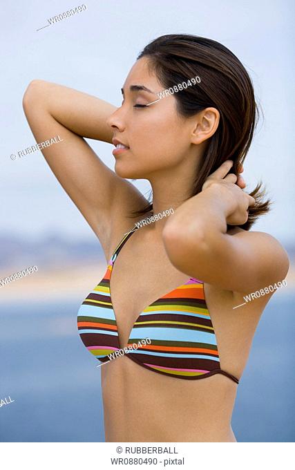 Close-up of a young woman wearing a bikini