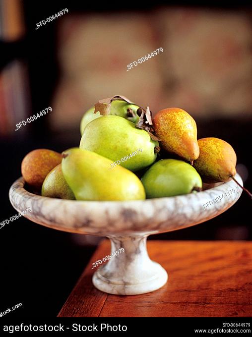 Bosc and Comice Pears in a Pedestal Bowl