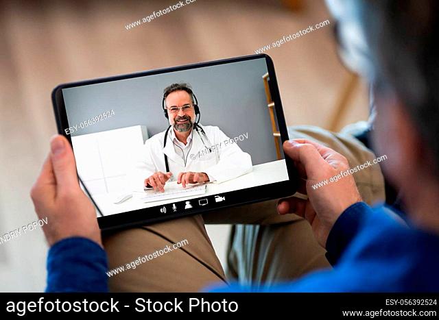 Medical Online Video Conference With Doctor On Tablet Computer