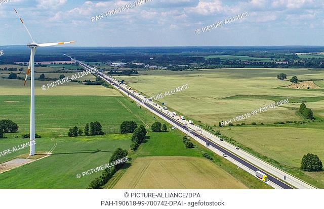 17 June 2019, Brandenburg, Biegen: The motorway BAB 12 near the junction Müllrose, view in west direction, aerial view with a drone