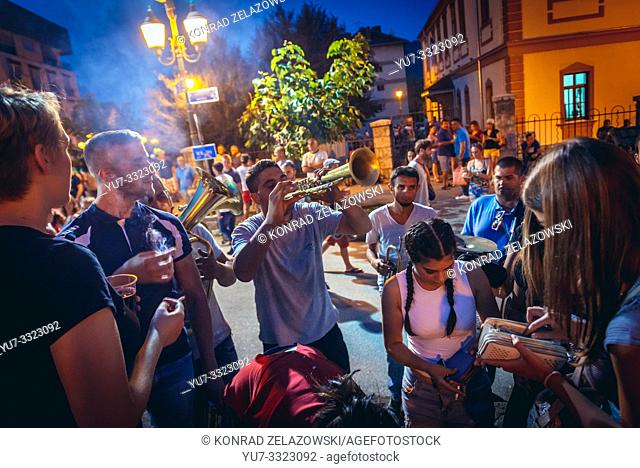 Street musicians playing Balcan music for money during famous annual Trumpet Festival in Guca village, Serbia, also known as Dragacevski Sabor, 2017