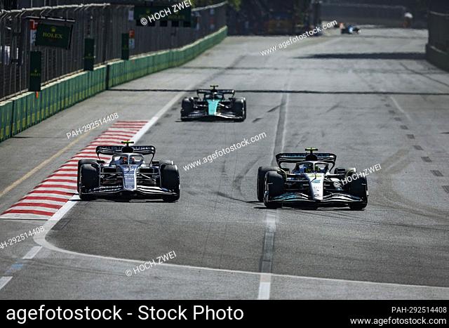 #22 Yuki Tsunoda (JPN, Scuderia AlphaTauri), #44 Lewis Hamilton (GBR, Mercedes-AMG Petronas F1 Team), F1 Grand Prix of Azerbaijan at Baku City Circuit on June...