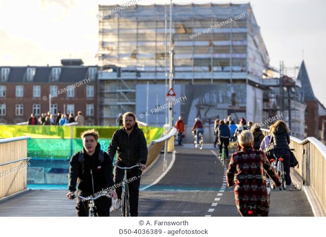 Copenhagen, Denmark Bicyclists cross the Inderhavnsbroen, a pedestrian and cycle bridge near Nyhavn