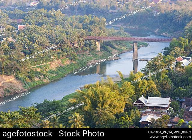 View over Nam Khan River from Wat Phousi Temple, Laos. Wat Phousi is the number one temple and tourist attraction in Luang Prabang thanks to its perfect views...