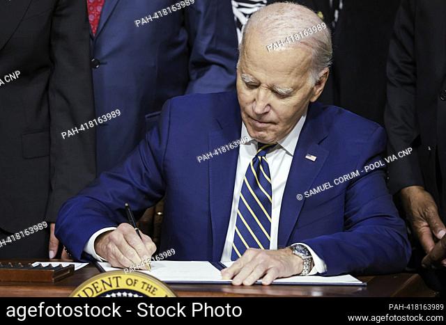 United States President Joe Biden signs a proclamation to establish the Emmett Till and Mamie Till-Mobley National Monument during an event in the Indian Treaty...