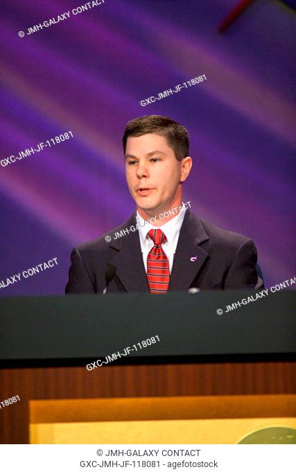 Kevin Engelbert, Deputy Expedition 11 Increment Manager, responds to a query from a media representative during a preflight press briefing at the Johnson Space...