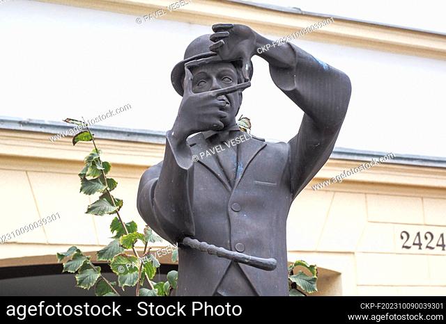 Charlie Chaplin statue (2006) of Libor Hurda - placed front of Hotel Biograf in Pisek town, Czech Republic, September 17, 2023