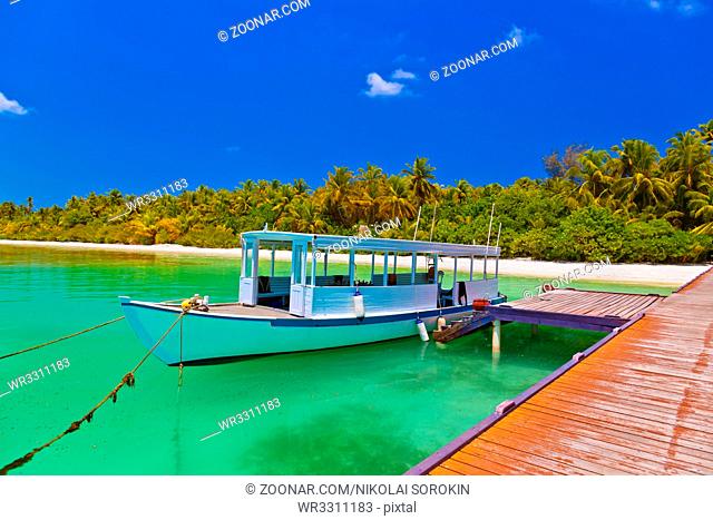 Tropical island and boat - nature travel background