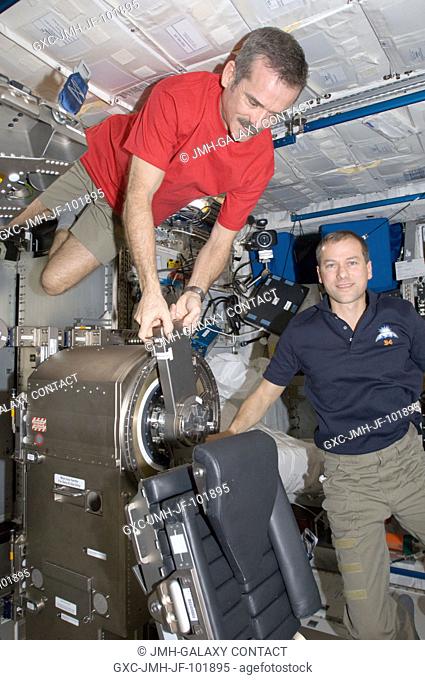 Canadian Space Agency astronaut Chris Hadfield (left) and NASA astronaut Tom Marshburn, both Expedition 34 flight engineers