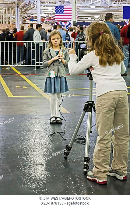 Redford, Michigan - Seven-year-old girls report for Kid Witness News during a visit by President Barack Obama to a Detroit Diesel factory  Kid Witness News is a...