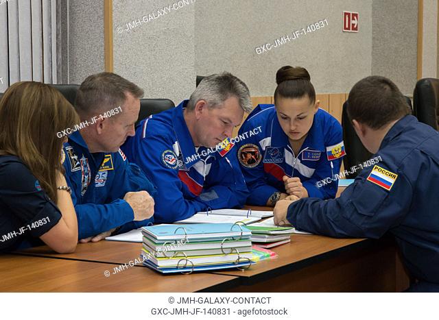 At the Cosmonaut Hotel crew quarters in Baikonur, Kazakhstan, Expedition 41 Flight Engineer Barry Wilmore of NASA (left)