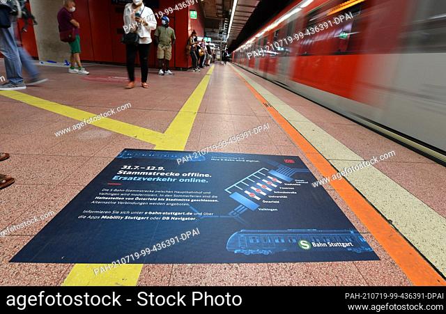 19 July 2021, Baden-Wuerttemberg, Stuttgart: A sticker on the floor in the S-Bahn station at the main station indicates the upcoming line closure