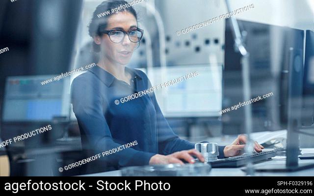 Industrial engineer using a computer