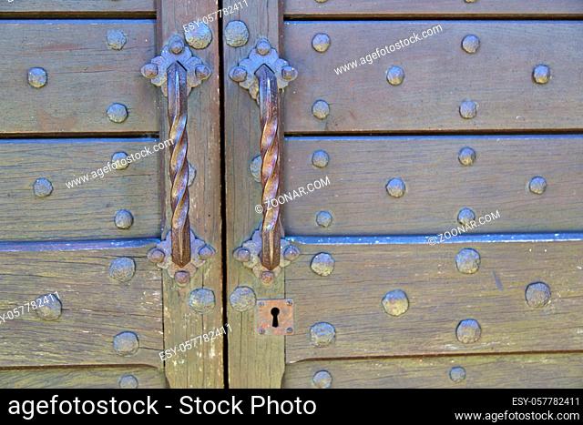 abstract house door  in italy  lombardy  column the milano old    closed nail rusty