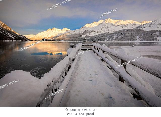 Walkway covered with snow, Lake Sils, Plaun da Lej, Maloja Region, Canton of Graubunden, Engadine, Switzerland, Europe