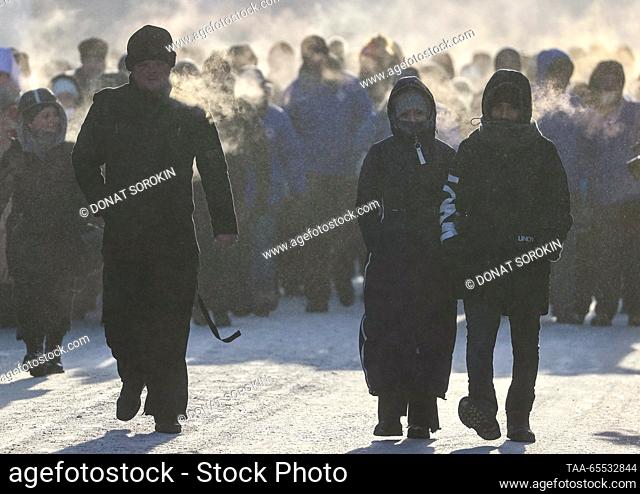 RUSSIA, YEKATERINBURG - DECEMBER 7, 2023: Russian Orthodox believers are seen at St Catherine's Chapel during a religious procession marking the Day of Great...