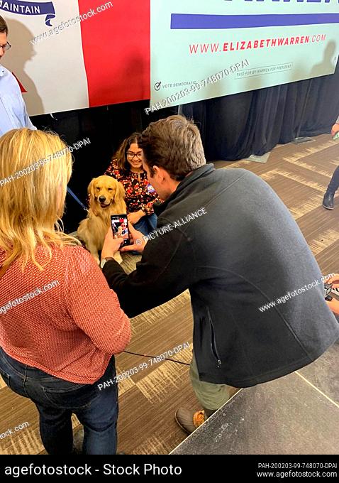 02 February 2020, US, Des Moines: Warren's family dog Bailey is photographed for Selfies with supporters of the Democratic presidential candidate Elizabeth...