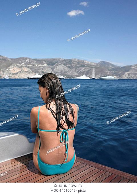 Back View of Woman Sitting on Boat