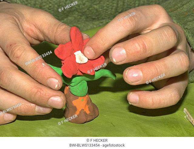 kids tinker flowers of modeling clay