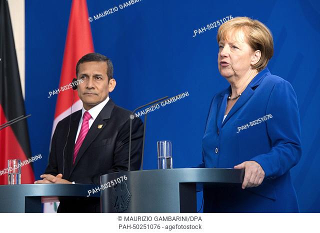 German Chancellor Angela Merkel (CDU, R) and Peruvian President Ollanta Humala Tasso speak during a press conference in Berlin, Germany, 14 July 2014