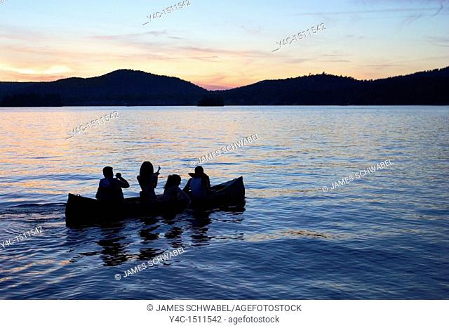 Canoe on Fourth Lake at sunset, Inlet, New York, Adirondack Mountains