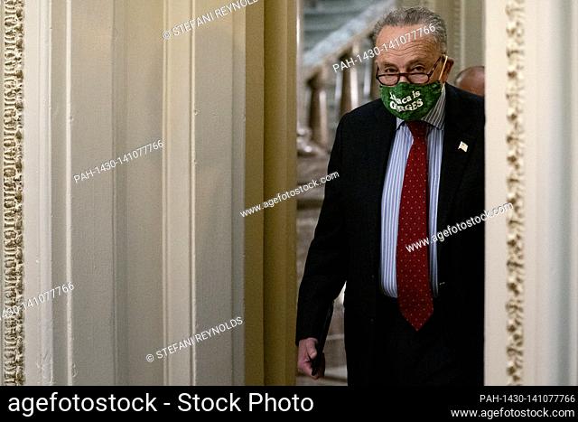 United States Senate Majority Leader Chuck Schumer (Democrat of New York) wears a protective mask while arriving to the U.S. Capitol in Washington D.C