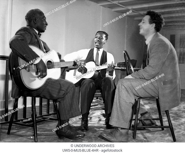 New York, New York: c. 1940.L-R: Leadbelly, Josh White and Nicholas Ray. Ray became a film director; amongst his more notable films was Rebel Without A Cause
