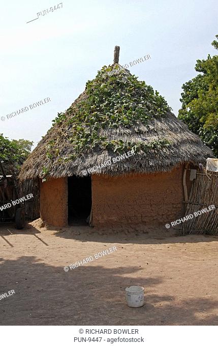 A thatched Gambian mud hut