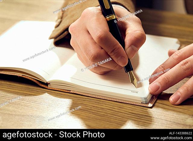 Man writing on paper