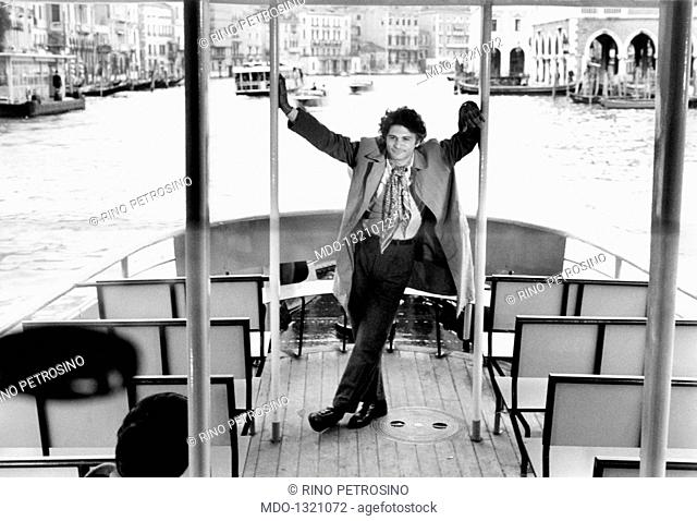 Tony Musante on a boat. The American actor Tony Musante (Anthony Peter Musante) posing on a boat. Venice, 1970