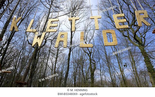 climbing park entrance, wooden letters in a forest , Germany, North Rhine-Westphalia