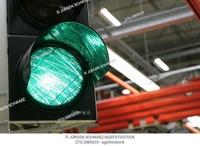 Green traffic light in a factory building